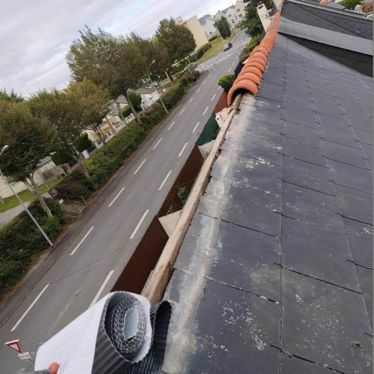 Pose d'un nouveau faîtage sur Quimper